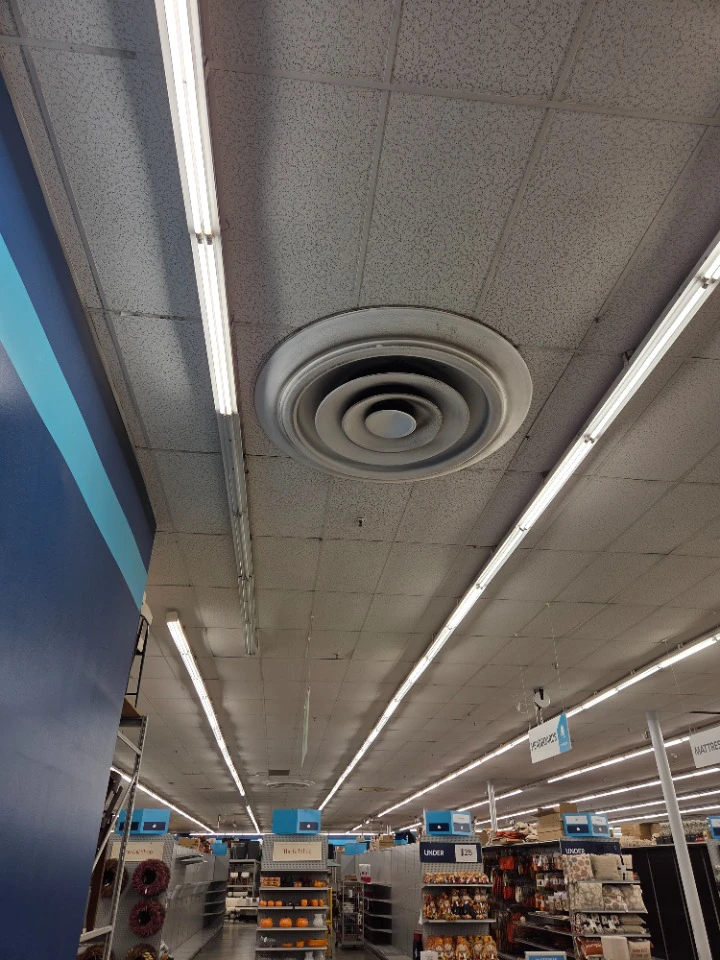 Supply diffuser over the sales floor of a big-box retail store
