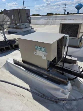Rooftop condensing unit serving the ice cream freezer